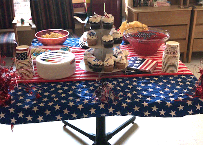 4th of July table set up with Cupcakes and food